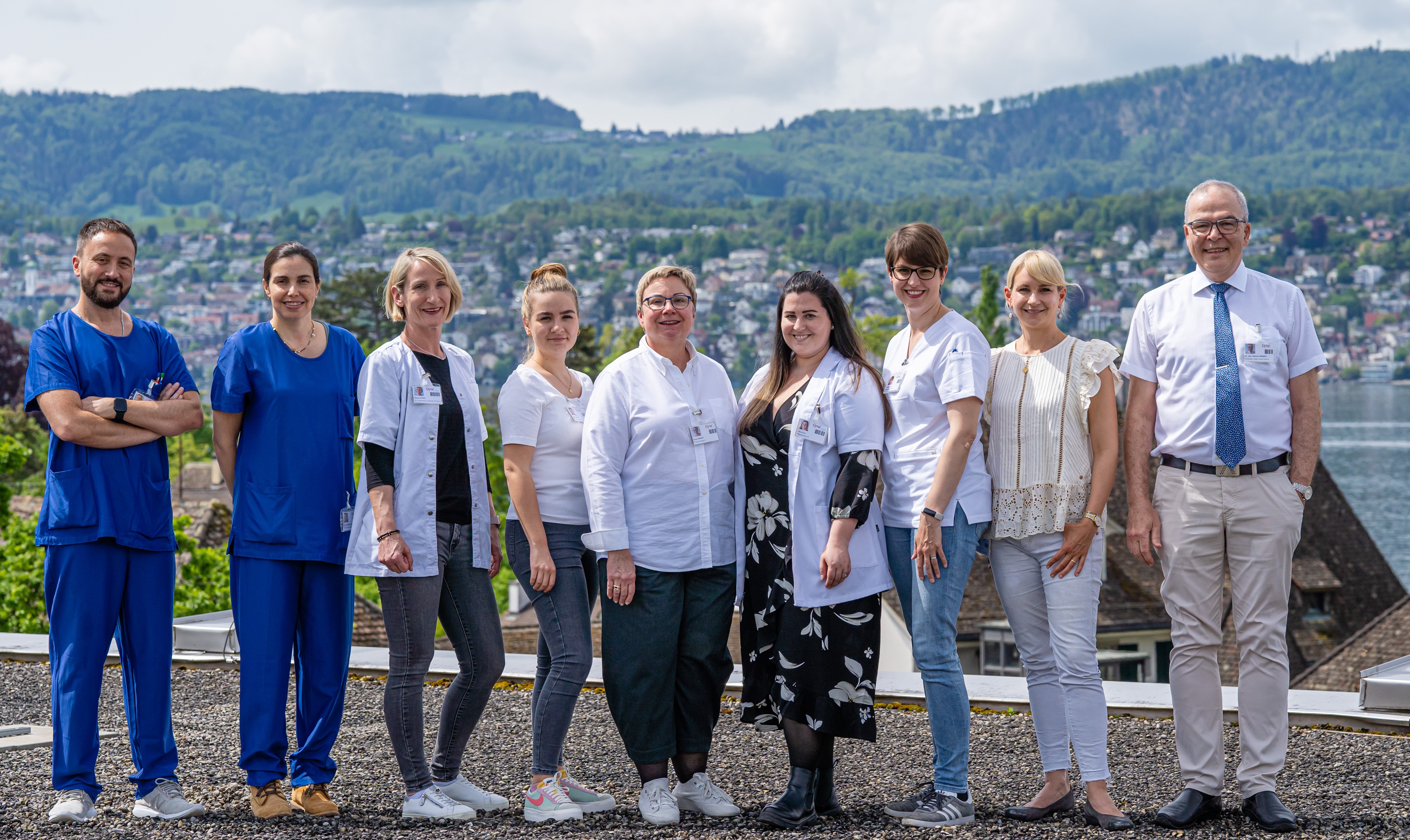 Team Dr Singer on rooftop of practice building (2023) - click to enlarge